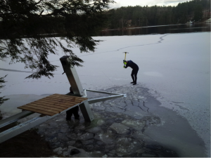 Viking Boat Lift in winter ice chopping